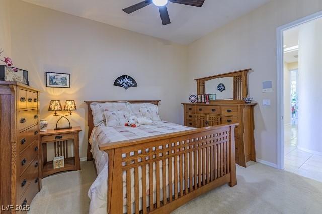 10524 Longwood Dr, Las Vegas, NV 89134 - bedroom with baseboards, ceiling fan, and carpet floors