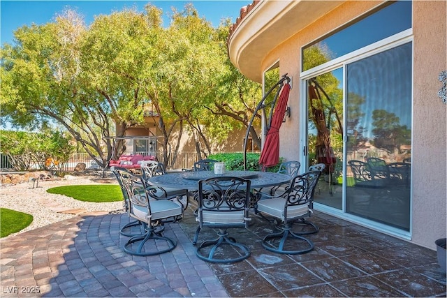 10524 Longwood Dr, Las Vegas, NV 89134 - view of patio featuring outdoor dining area and fence