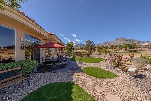 10524 Longwood Dr, Las Vegas, NV 89134 - view of yard with a patio area and a mountain view