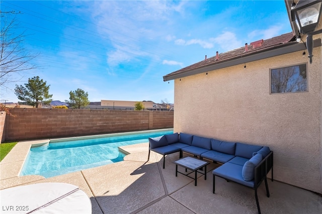 view of pool featuring a patio, an outdoor living space, fence, and a fenced in pool