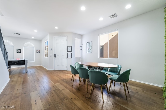 dining space featuring visible vents, recessed lighting, and wood-type flooring