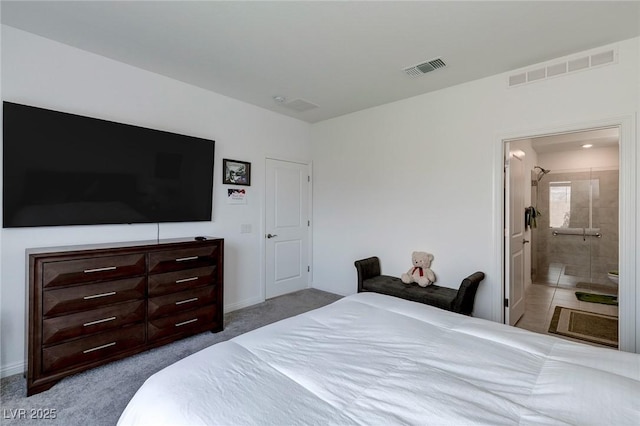 2114 Cold Canyon Ave, North Las Vegas, NV 89086 - carpeted bedroom with visible vents and ensuite bath