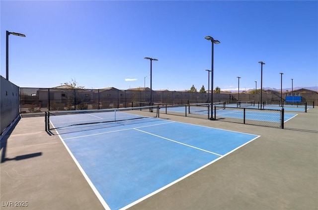 2114 Cold Canyon Ave, North Las Vegas, NV 89086 - view of tennis court featuring fence