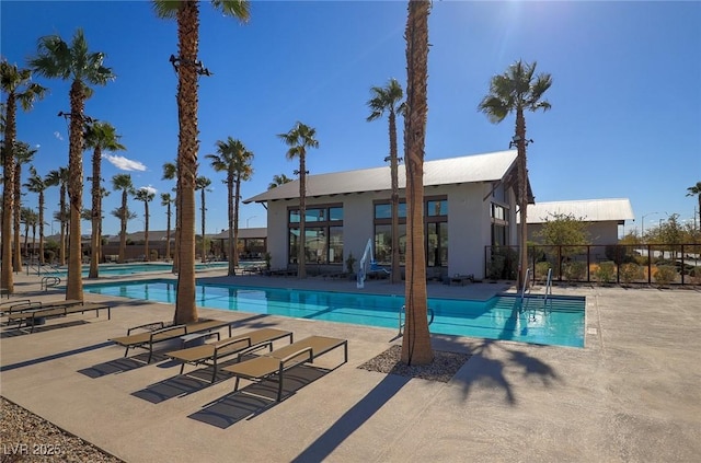 2114 Cold Canyon Ave, North Las Vegas, NV 89086 - pool with a patio and fence