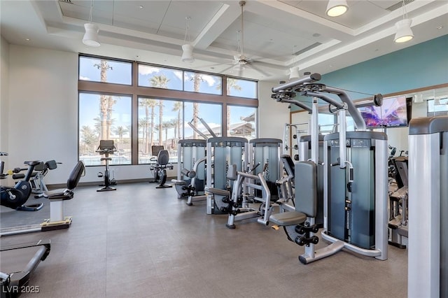 2114 Cold Canyon Ave, North Las Vegas, NV 89086 - gym featuring baseboards, a ceiling fan, a raised ceiling, a high ceiling, and coffered ceiling