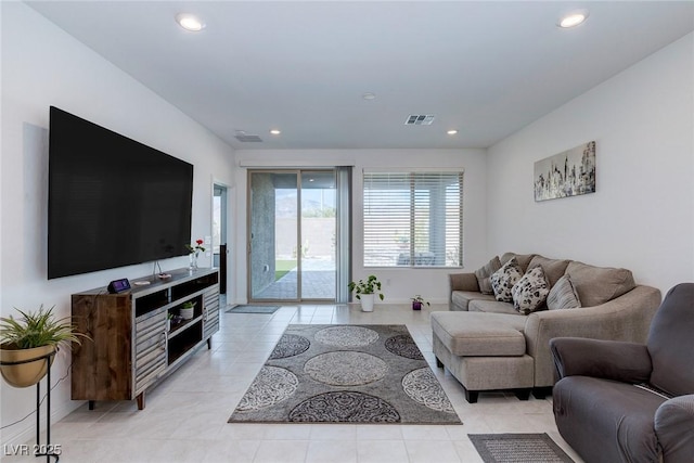 2114 Cold Canyon Ave, North Las Vegas, NV 89086 - living room with visible vents, recessed lighting, and light tile patterned floors