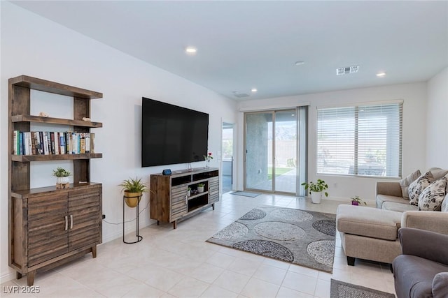2114 Cold Canyon Ave, North Las Vegas, NV 89086 - living area with baseboards, visible vents, recessed lighting, and light tile patterned flooring