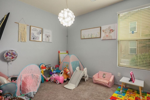 rec room featuring carpet