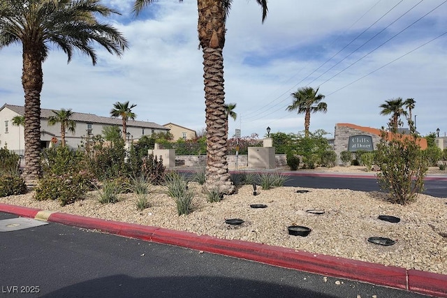view of front of home featuring fence