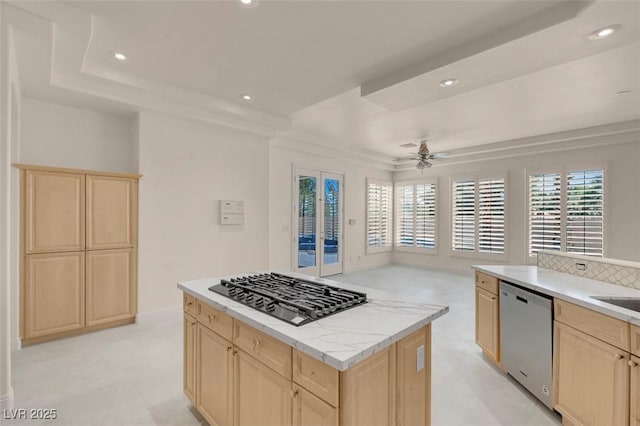2290 Casa Bella Ct, Las Vegas, NV 89117 - kitchen with stainless steel dishwasher, light brown cabinets, gas stovetop, and recessed lighting