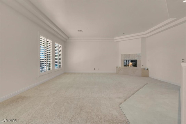 2290 Casa Bella Ct, Las Vegas, NV 89117 - unfurnished living room with light colored carpet and a fireplace