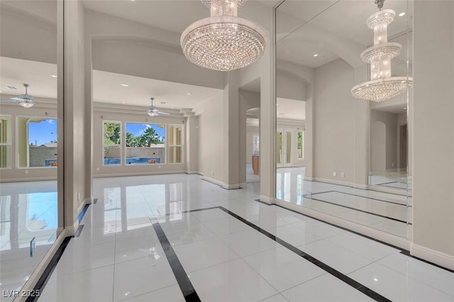 2290 Casa Bella Ct, Las Vegas, NV 89117 - unfurnished room featuring a chandelier, a ceiling fan, inlaid floor details, and recessed lighting
