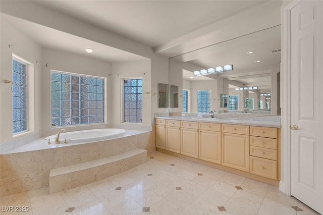 2290 Casa Bella Ct, Las Vegas, NV 89117 - full bath with vanity, a garden tub, and healthy amount of natural light