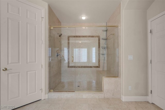 2290 Casa Bella Ct, Las Vegas, NV 89117 - bathroom with a stall shower and baseboards