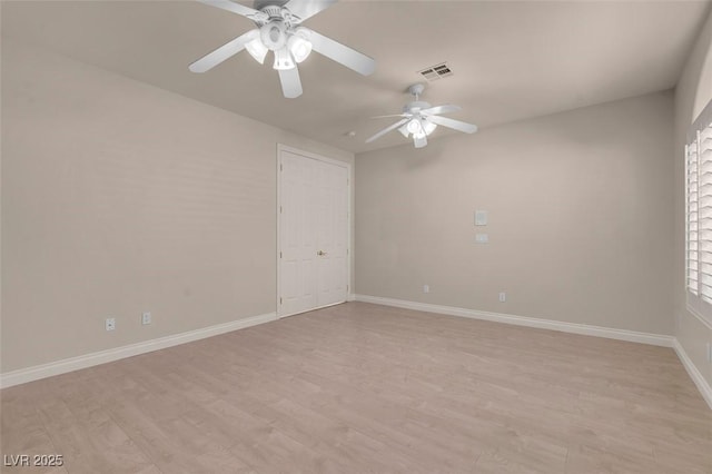 2290 Casa Bella Ct, Las Vegas, NV 89117 - unfurnished room with a ceiling fan and light wood-style flooring