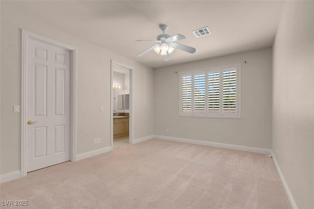 2290 Casa Bella Ct, Las Vegas, NV 89117 - unfurnished bedroom featuring carpet flooring, connected bathroom, and a ceiling fan