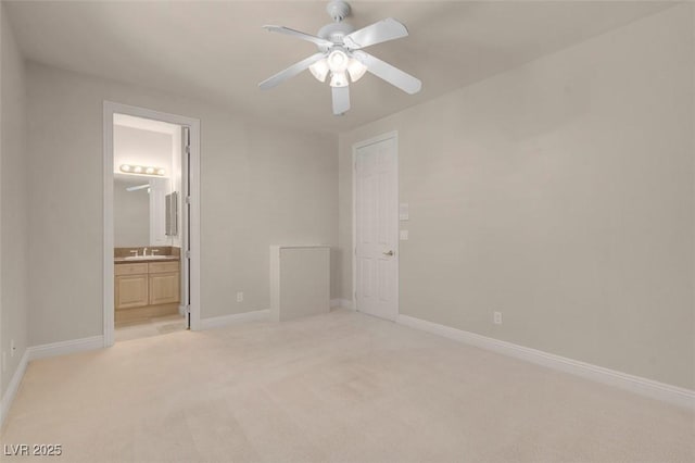 2290 Casa Bella Ct, Las Vegas, NV 89117 - unfurnished bedroom featuring light colored carpet, ensuite bathroom, and ceiling fan