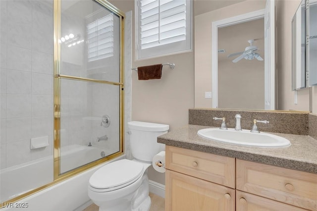 2290 Casa Bella Ct, Las Vegas, NV 89117 - bathroom with vanity, combined bath / shower with glass door, and a ceiling fan