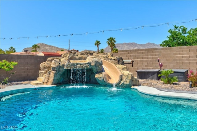 9511 Star Vista Ct, Las Vegas, NV 89149 - view of swimming pool featuring fence and a water slide