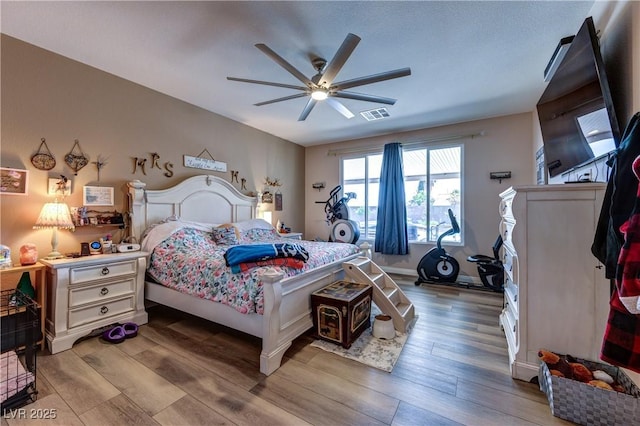 9511 Star Vista Ct, Las Vegas, NV 89149 - bedroom with wood finished floors and a ceiling fan