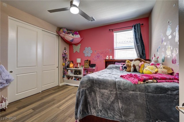 9511 Star Vista Ct, Las Vegas, NV 89149 - bedroom with wood finished floors, ceiling fan, and a closet