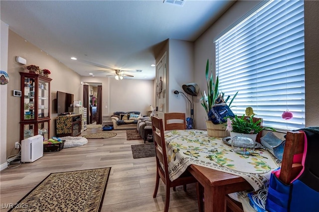 9511 Star Vista Ct, Las Vegas, NV 89149 - dining area with light wood-style floors, a ceiling fan, and recessed lighting