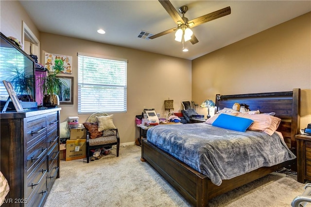 9511 Star Vista Ct, Las Vegas, NV 89149 - bedroom with light colored carpet, ceiling fan, recessed lighting, and baseboards