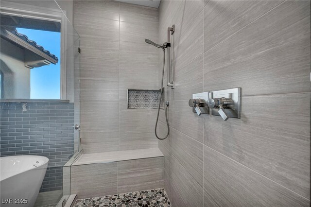 12283 Lost Treasure Ave, Las Vegas, NV 89138 - bathroom featuring a freestanding bath and tiled shower
