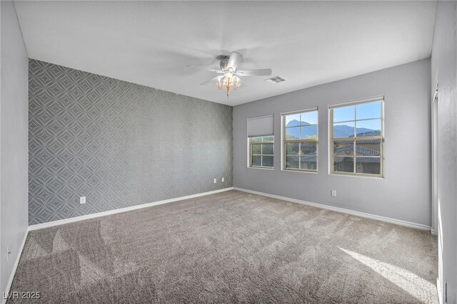 12283 Lost Treasure Ave, Las Vegas, NV 89138 - spare room with baseboards, ceiling fan, and carpet flooring