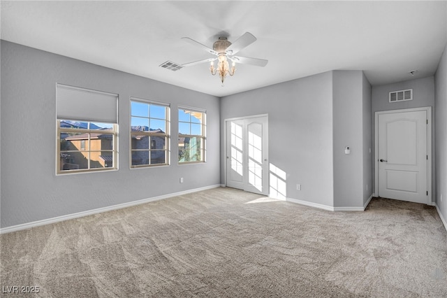 12283 Lost Treasure Ave, Las Vegas, NV 89138 - unfurnished room with carpet floors, a ceiling fan, and visible vents