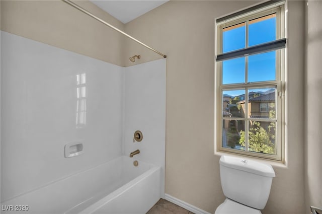 12283 Lost Treasure Ave, Las Vegas, NV 89138 - full bathroom with toilet, baseboards, a healthy amount of sunlight, and shower / bathing tub combination