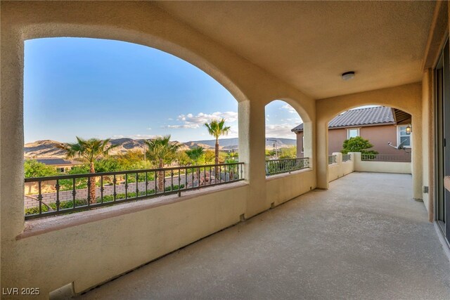 12283 Lost Treasure Ave, Las Vegas, NV 89138 - view of patio / terrace with a mountain view and a balcony