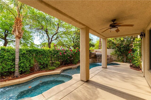 812 Eaglewood Dr, Las Vegas, NV 89144 - view of swimming pool with a ceiling fan, a fenced backyard, a patio area, and a pool with connected hot tub