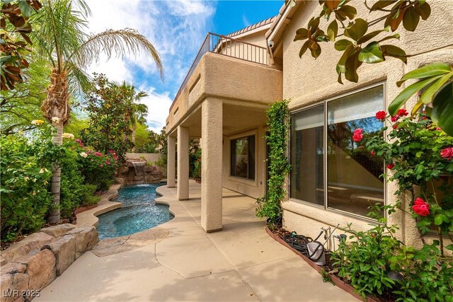 812 Eaglewood Dr, Las Vegas, NV 89144 - outdoor pool featuring a patio area and a fenced backyard