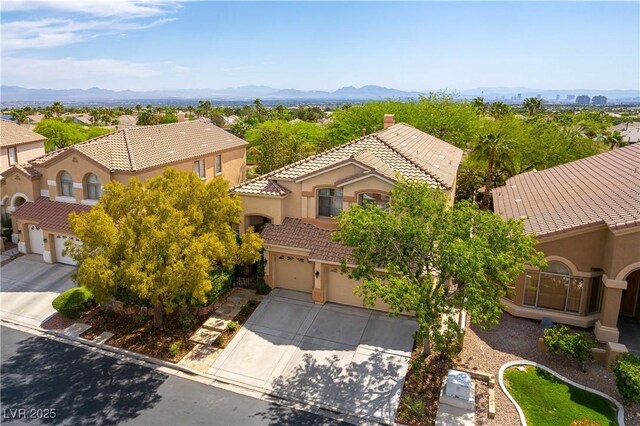 812 Eaglewood Dr, Las Vegas, NV 89144 - aerial view of property and surrounding area featuring a mountain backdrop