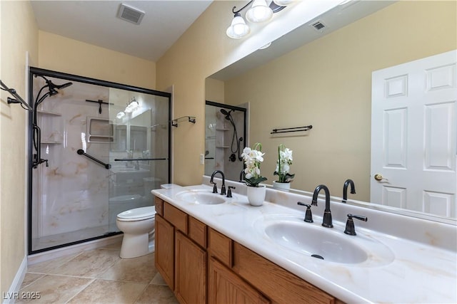 812 Eaglewood Dr, Las Vegas, NV 89144 - bathroom with double vanity, a stall shower, and tile patterned flooring
