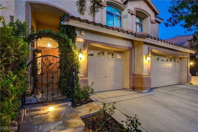 812 Eaglewood Dr, Las Vegas, NV 89144 - mediterranean / spanish home with driveway, a tiled roof, and a garage