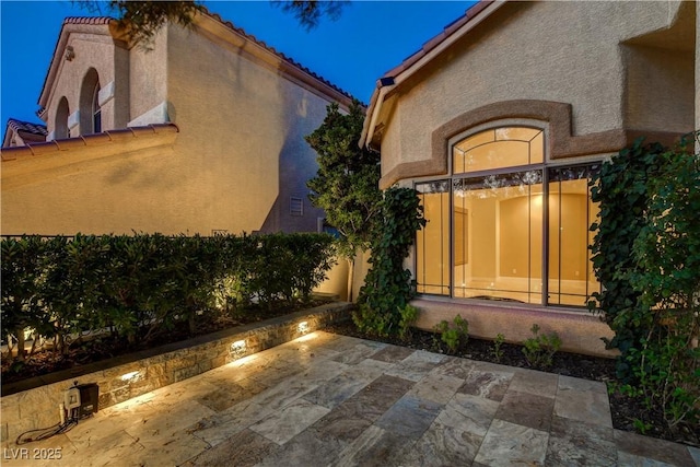 812 Eaglewood Dr, Las Vegas, NV 89144 - patio at night featuring a patio area