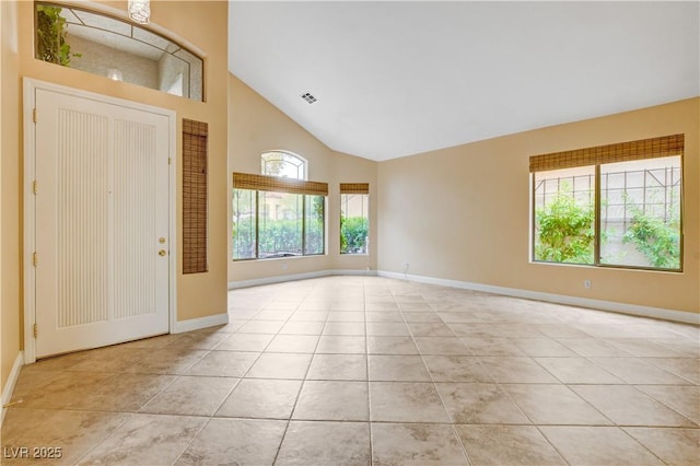 812 Eaglewood Dr, Las Vegas, NV 89144 - entrance foyer featuring light tile patterned floors and high vaulted ceiling