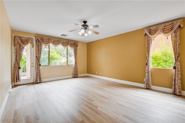 812 Eaglewood Dr, Las Vegas, NV 89144 - unfurnished room with ceiling fan, light wood finished floors, and plenty of natural light