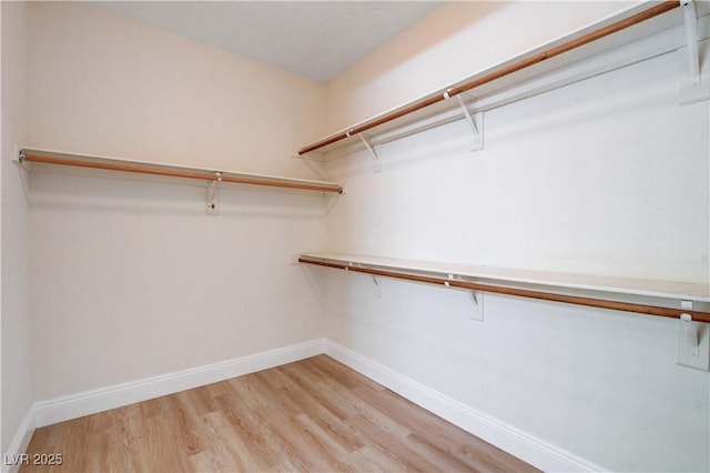 812 Eaglewood Dr, Las Vegas, NV 89144 - walk in closet featuring light wood-style floors