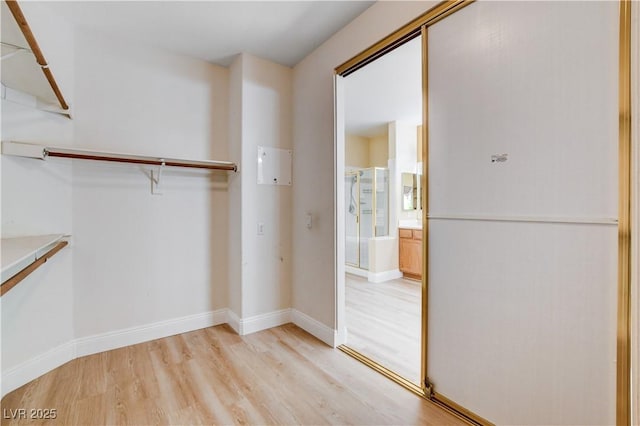 812 Eaglewood Dr, Las Vegas, NV 89144 - walk in closet with light wood finished floors