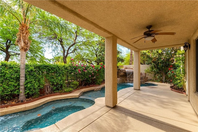 812 Eaglewood Dr, Las Vegas, NV 89144 - view of swimming pool featuring ceiling fan, a fenced backyard, a patio, and a pool with connected hot tub