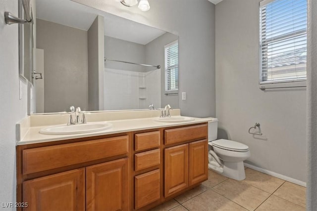 640 Finch Island Ave, Henderson, NV 89015 - bathroom with a sink, tile patterned flooring, and toilet