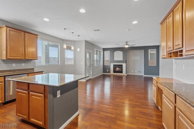 640 Finch Island Ave, Henderson, NV 89015 - kitchen with recessed lighting, stainless steel dishwasher, a ceiling fan, and dark wood finished floors