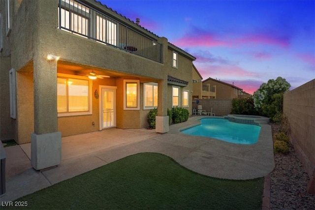 640 Finch Island Ave, Henderson, NV 89015 - view of swimming pool with a fenced backyard, a patio, and a pool with connected hot tub