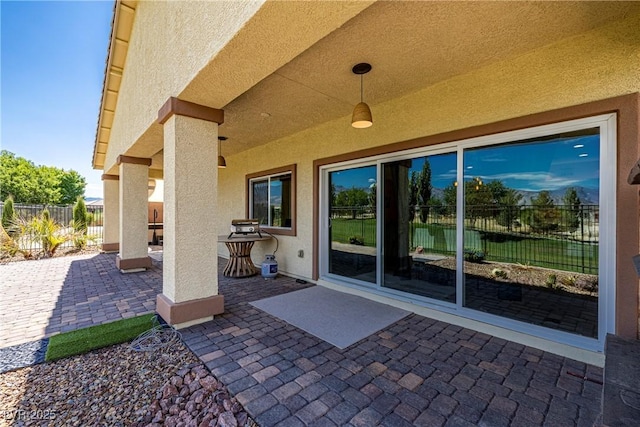 view of patio / terrace with fence