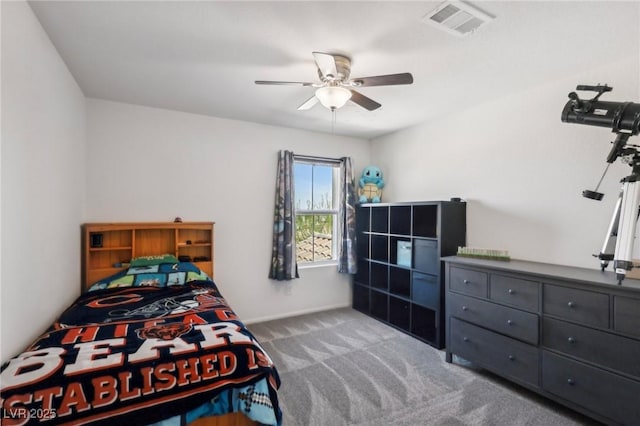 bedroom featuring baseboards, visible vents, ceiling fan, and carpet