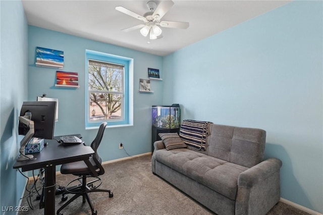 office with a ceiling fan, carpet flooring, and baseboards