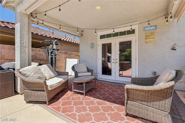 view of patio featuring french doors